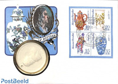 Cover with stamps+token porcelain
