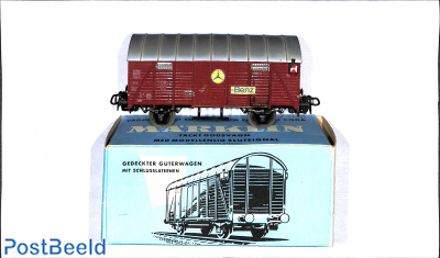 Closed goods car with tail lights